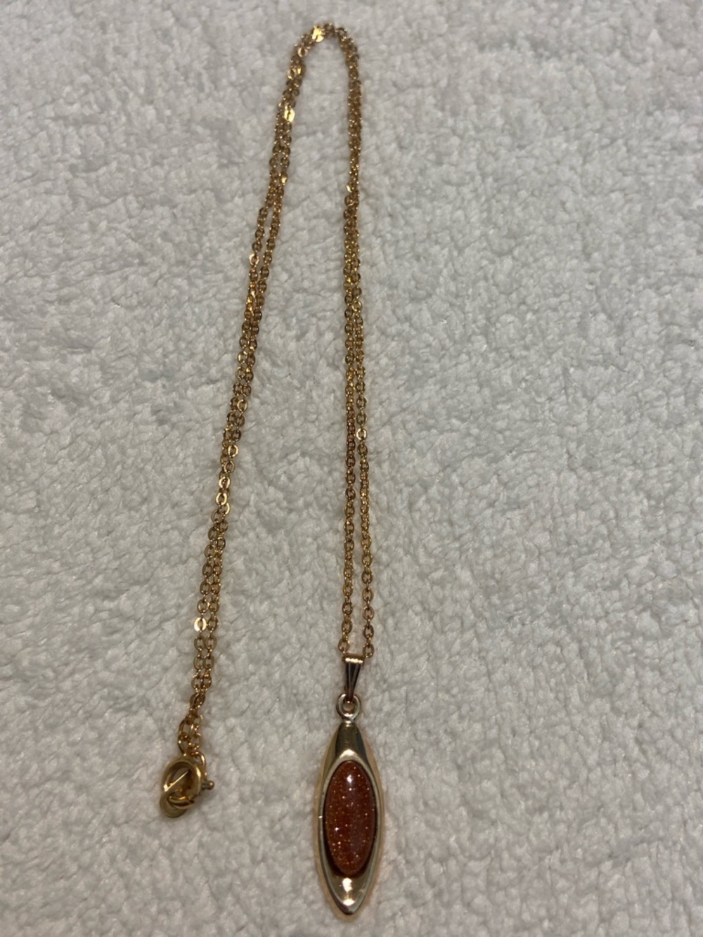 Gold-Tone Pendant Necklace with Sparkling Goldstone Accent